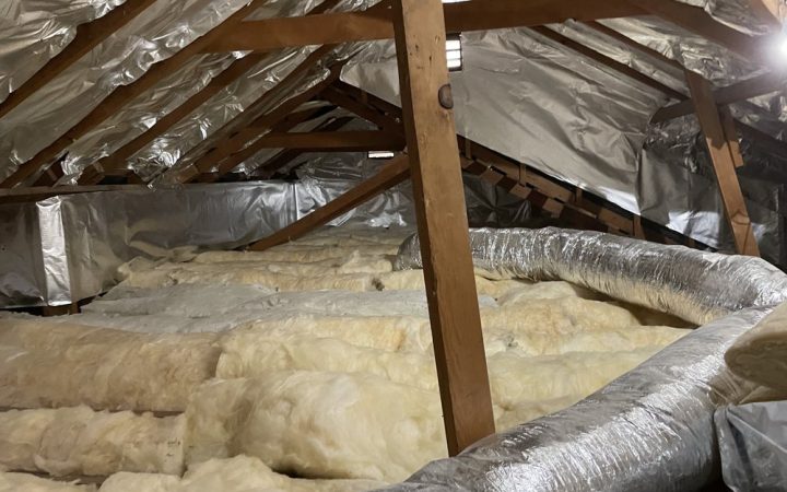 Attic Insulation Contractor Installing Insulation In Las Vegas Attic